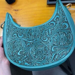 Genuine tooled leather bag